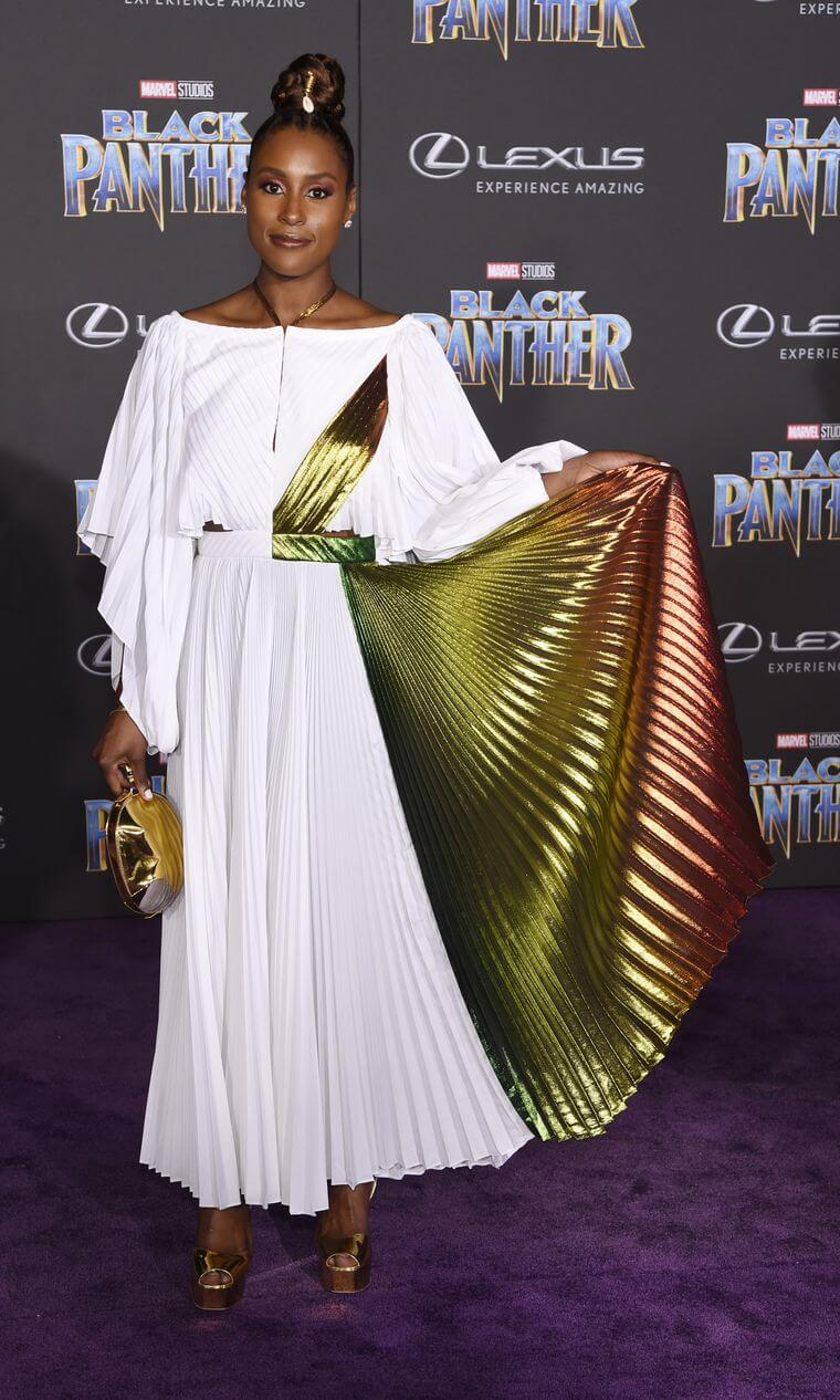 Issa Rae wears Rosie Assoulin on the Black Panther red carpet.