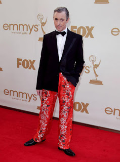 Alan Cumming on the red carpet at the 63rd Annual Emmy Awards.