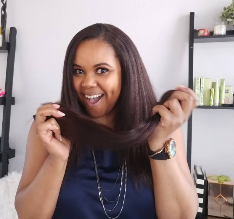 patranila holds freshly colored hair extensions