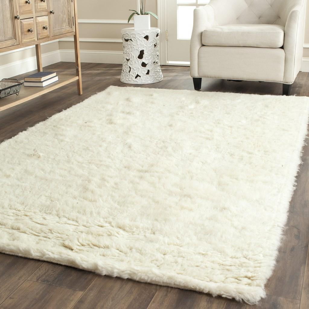 White shag and flokati area rug.