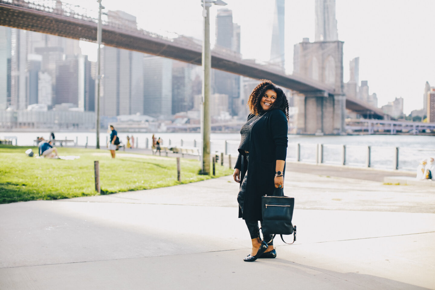 patranila wears long black cardigan