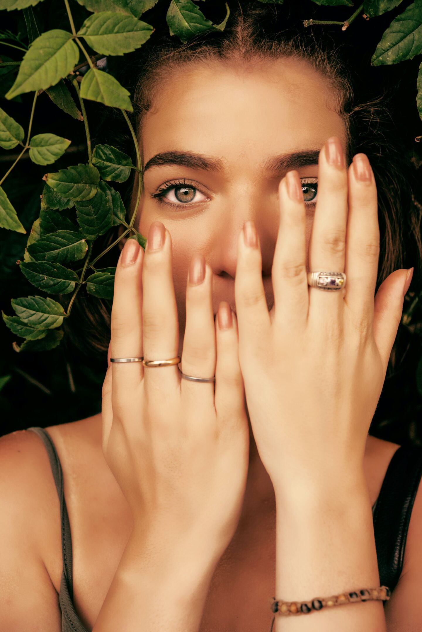 Woman with fresh manicure and rings on her fingers