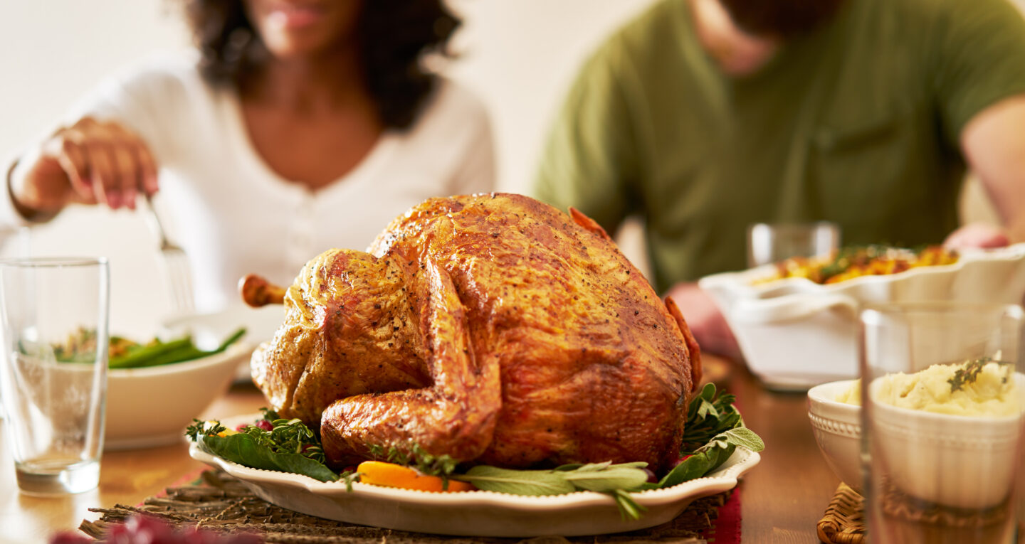 thanksgiving feasts without the fuss - people eating thanksgiving dinner